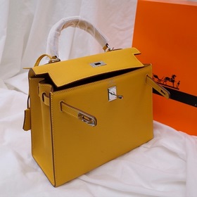 Сумка Hermes Kelly через плечо с золотой пряжкой цвета янтаря Кож