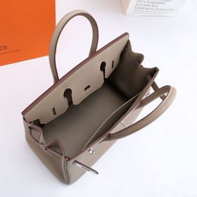Сумка Birkin от Hermès, серого цвета серебряными застежками. Импо
