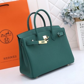 Сумка Hermes Birkin, зеленая, с золотыми серебряными застежками. 