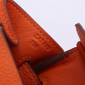 Сумка Birkin от Hermès, оранжевая, золотая и серебряная застежка,