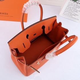Сумка Birkin от Hermès, оранжевая, золотая и серебряная застежка,