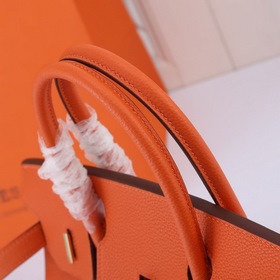 Сумка Birkin от Hermès, оранжевая, золотая и серебряная застежка,