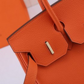 Сумка Birkin от Hermès, оранжевая, золотая и серебряная застежка,