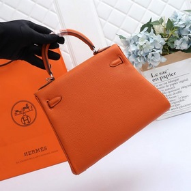 Сумка Hermes Kelly через плечо, оранжевая с золотыми серебряными 