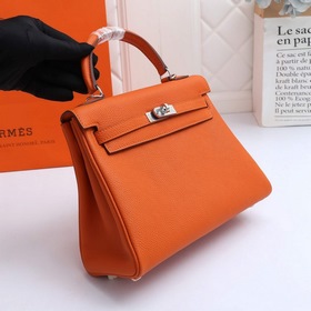 Сумка Hermes Kelly через плечо, оранжевая с золотыми серебряными 