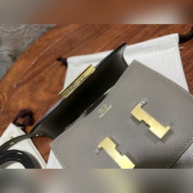 Hermès Constance Slim клатч с ремнем через плечо В настоящее врем