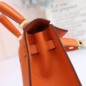 Сумка Hermes Kelly через плечо, оранжевая с золотыми серебряными 