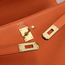 Сумка Hermes Kelly через плечо, оранжевая с золотыми серебряными 