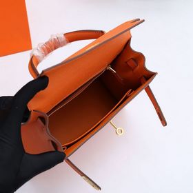 Сумка Hermes Kelly через плечо, оранжевая с золотыми серебряными 