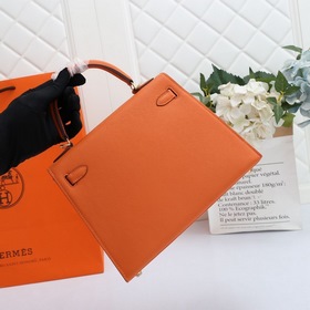 Сумка Hermes Kelly через плечо, оранжевая с золотыми серебряными 
