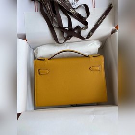Hermes Mini Kelly PouchetteСумка с золотой пряжкой цвета янтарног