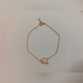 HERMES Hermes Брелок из 18-каратного золота с ажурной отделкой Э