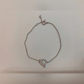 HERMES Hermes Брелок из 18-каратного золота с ажурной отделкой Э