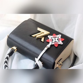 Средняя сумка LV Twist через плечо Средняя сумка Twist из зернист