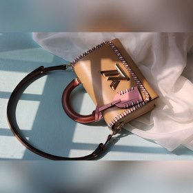 Средняя сумка LV Twist через плечо Средняя сумка Twist с уникальн