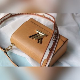 Средняя сумка LV Twist через плечо Средняя сумка Twist с уникальн