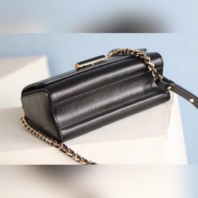 Средняя сумка LV Twist через плечо Средняя сумка Twist с изящными