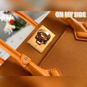 LV Модель M57730 Перфорированная сумка имбирно-желтого цвета Су