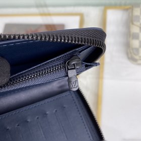 LV Zippy Vertical Кошелек Модель M80423  Этот кошелек Zippy Vert