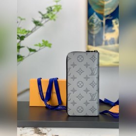 LV Zippy Vertical Кошелек Модель M81384 Этот кошелек Zippy Verti