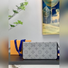 LV Zippy Vertical Кошелек Модель M81384 Этот кошелек Zippy Verti