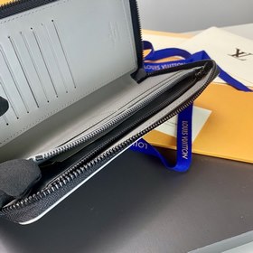 LV Zippy Vertical Кошелек Модель M81384 Этот кошелек Zippy Verti