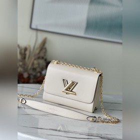 LV Модель M59761 Бежевая сумка с цепочкой Twist В 2015 году в ко