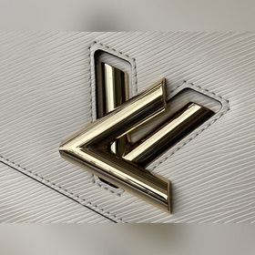 LV Модель M59761 Бежевая сумка с цепочкой Twist В 2015 году в ко