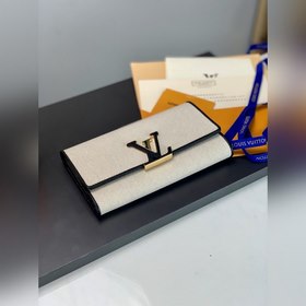 Кошелек LV, модель M81305 Этот кожаный кошелек изготовлен из мягк