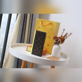 LV  BRAZZA Кошелек Модель M80790 Этот универсальный кошелек Braz