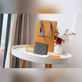 LV MULTIPLE Кошелек Этот кошелек Louis Vuitton Multiple отличаетс