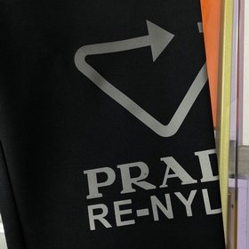 Классические брюки с логотипом бренда Prada Ткань изготовлена зак