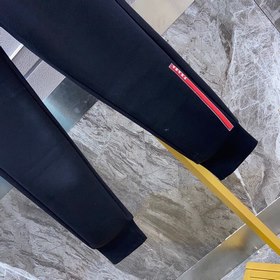 Классические брюки с логотипом бренда Prada Ткань изготовлена зак