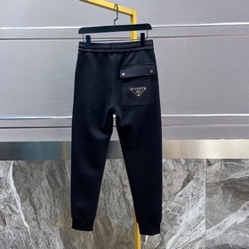 Классические брюки с логотипом бренда Prada Ткань изготовлена зак