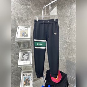 Классические брюки с логотипом бренда Prada Ткань изготовлена зак