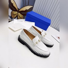 Стюарт Вайцман (Stuart Weitzman) — ультралегкие ботинки с резинов