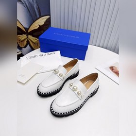 Стюарт Вайцман (Stuart Weitzman) — ультралегкие ботинки с резинов