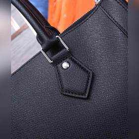LV модель M30811 Вертикальная сумка Креативная интерпретация диза