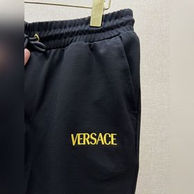 Versace Медуза вышивка на трикотажных брюках Спереди на левом кар