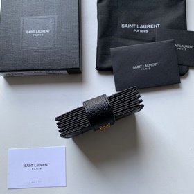 Новая модель кожаного кошелька Saint Laurent с аккордеонной склад