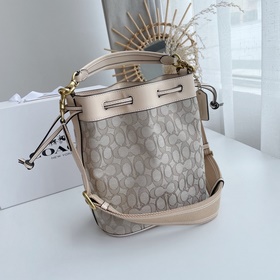 Coach Модель： C3853 Новая сумка-ведро из парусины с логотипом, с