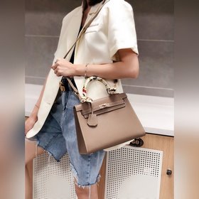 Hermès Kelly 25 см, 28 см, кожа с отпечатками ладоней, золотая з