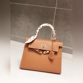 Hermès Kelly 25 см, 28 см, кожа с отпечатками ладоней, золотая за