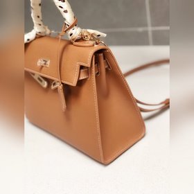 Hermès Kelly 25 см, 28 см, кожа с отпечатками ладоней, золотая за