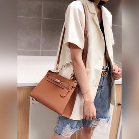 Hermès Kelly 25 см, 28 см, кожа с отпечатками ладоней, золотая за
