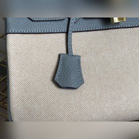 Hermès Сумка Hermès из платинового канваса с кожаными деталями 