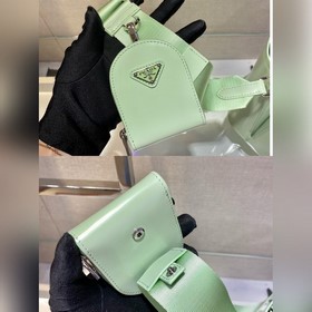 Prada  Новая модель сумки-бакета с гладкой поверхностью Артикул：