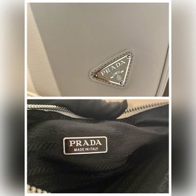 Prada Треугольная сумка Артикул： 1NQ043 Новая модель Эта треугол