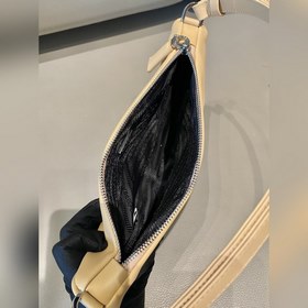 Prada Треугольная сумка Артикул： 1NQ043 Новая модель Эта треугол