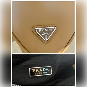 Prada Треугольная сумка Артикул： 1NQ043 Новая модель Эта треугол